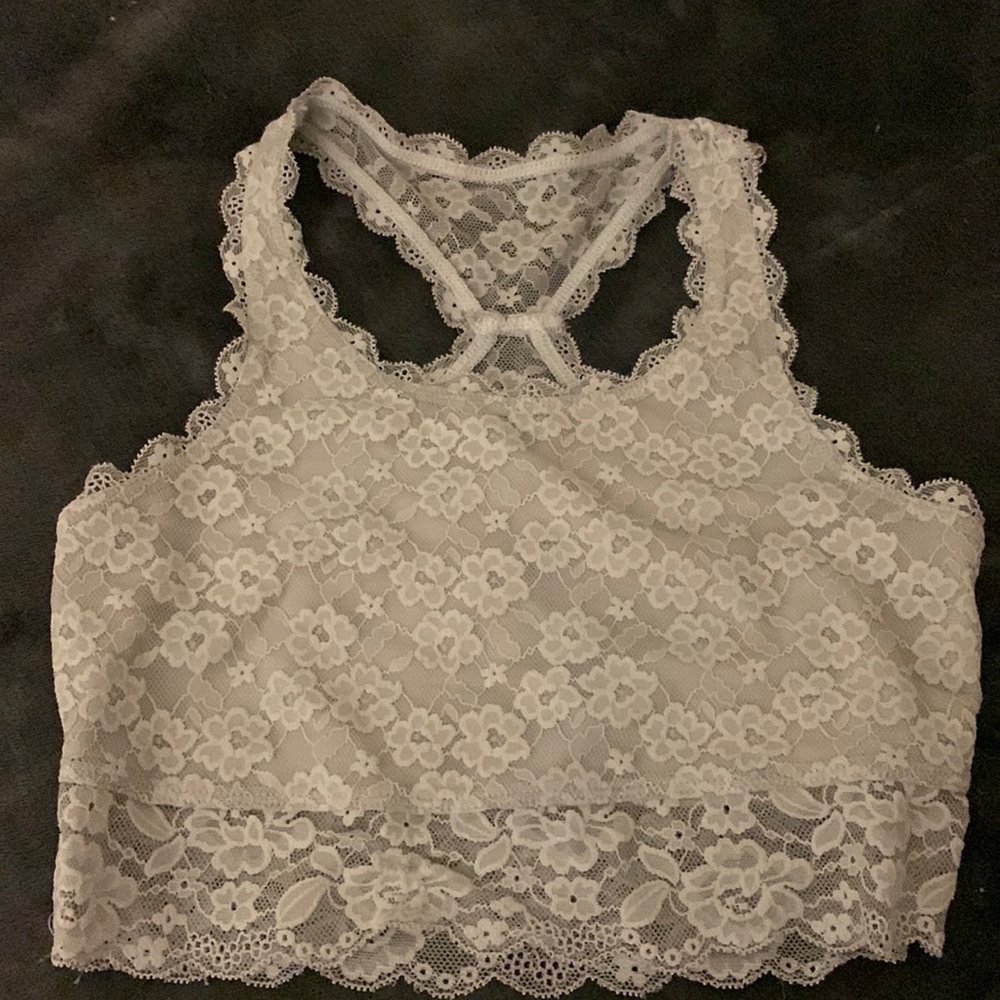 I’m selling a crop top with shirt with flowers